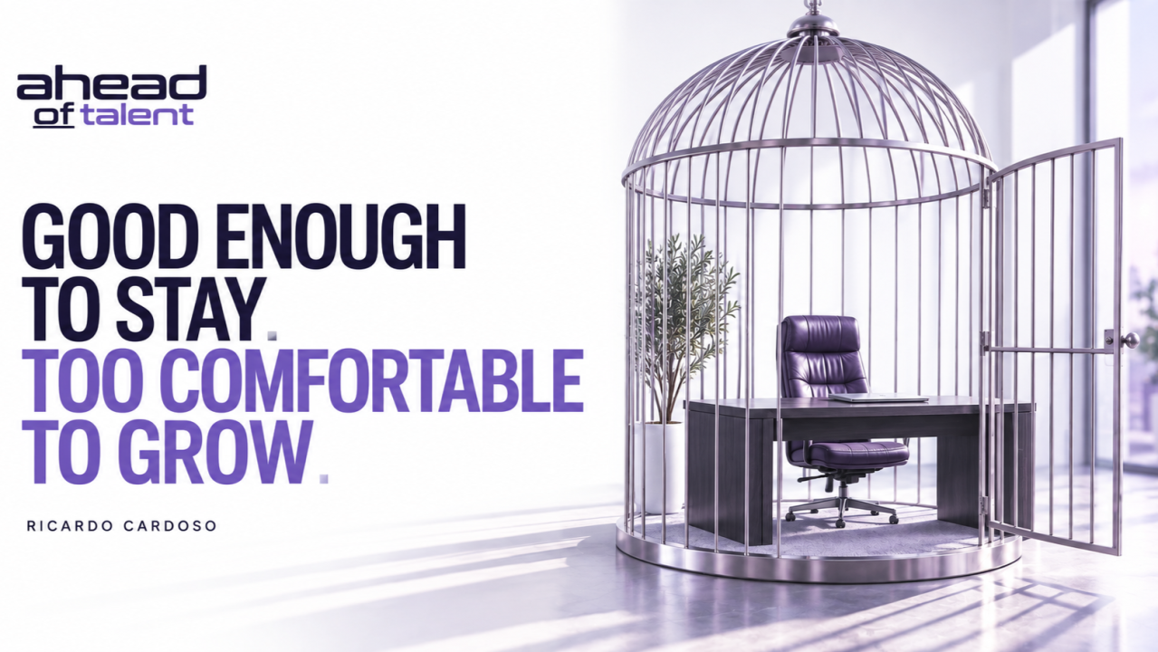 Good enough to stay. Too comfortable to grow. An open birdcage around an office desk.